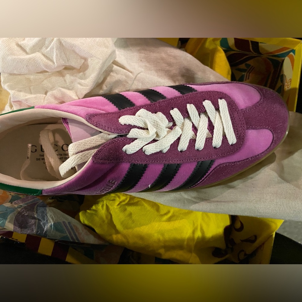 Gucci adidas tennis is a 10 but fits like an 11. Never worn..too big